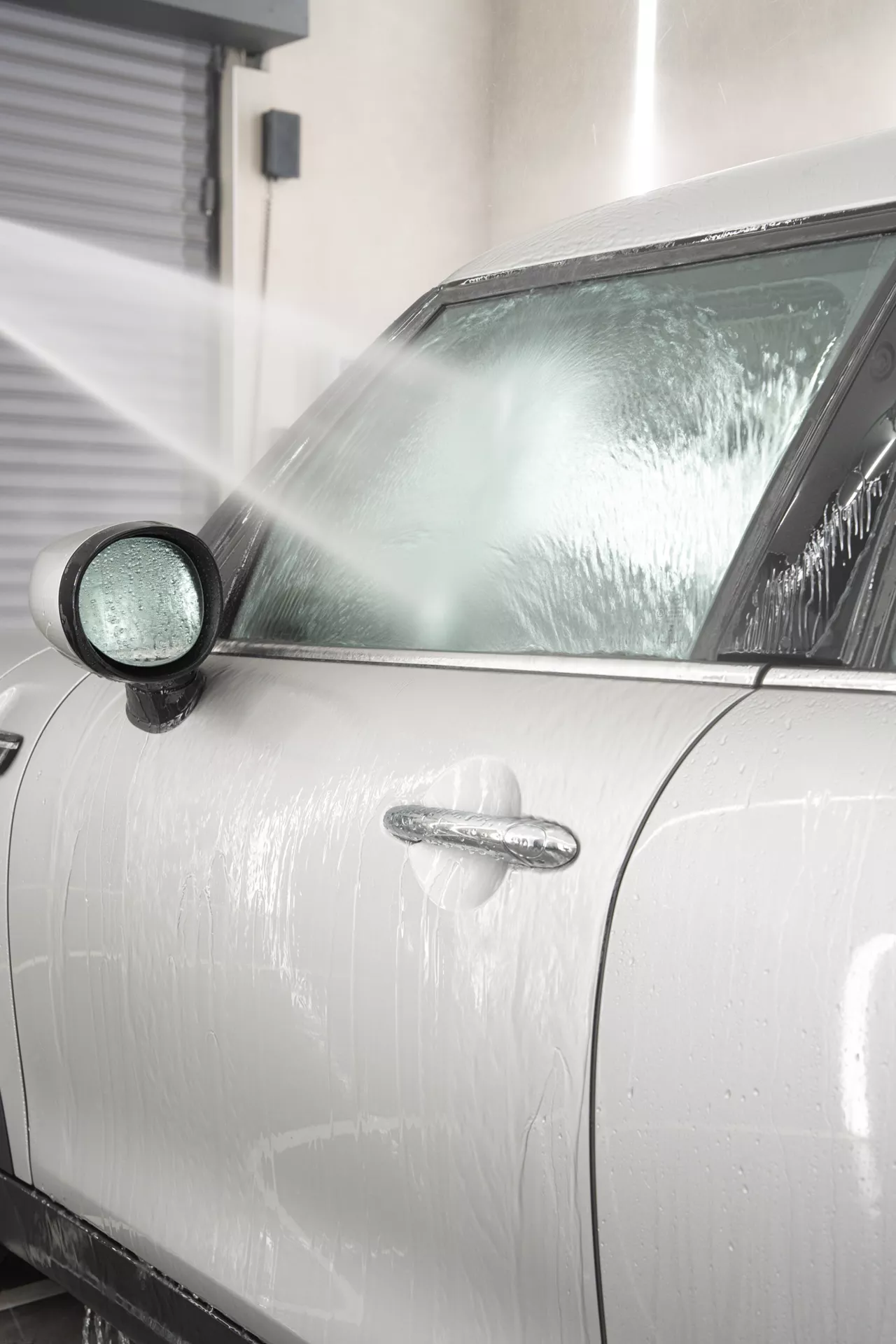 Rinçage de la carrosserie après l'application de Wet Coat